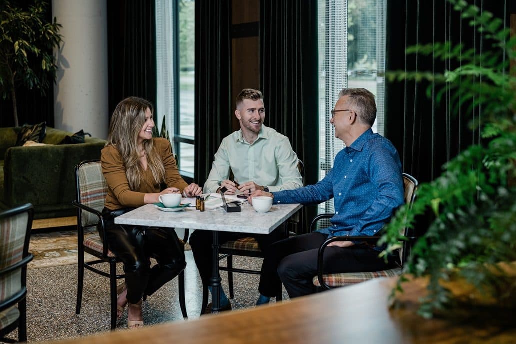 A coaching session over coffee with a venue team